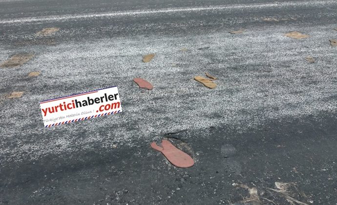 KUŞADASINDA SICAKTAN TERLİKLER ASFALTA YAPIŞTI 