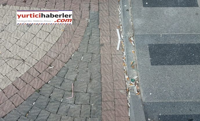 YAĞMUR OLUĞUNDAN İZMARİT AKIYOR